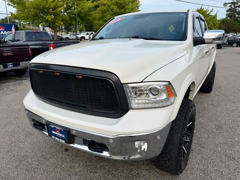 Used 2016 RAM 1500 Laramie w/ Convenience Group AWD/4WD image 1