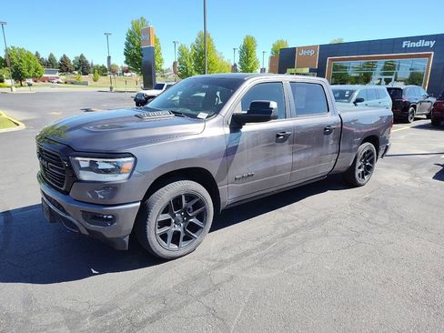 Used 2023 RAM 1500 Laramie AWD/4WD image 1