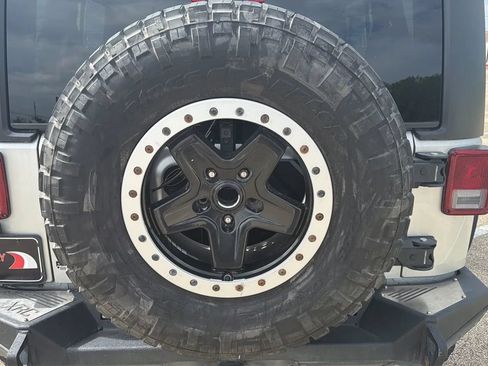 Used 2012 Jeep Wrangler Unlimited Sahara w/ Dual Top Group AWD/4WD image 14