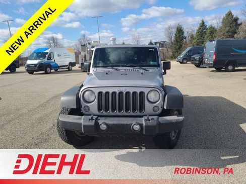 Certified 2016 Jeep Wrangler Unlimited Rubicon w/ Connectivity Group AWD/4WD image 1