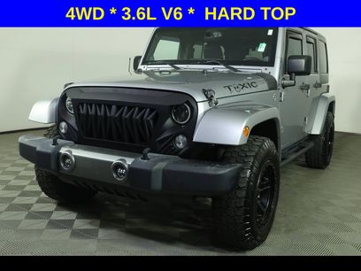 Used 2014 Jeep Wrangler Unlimited Sport