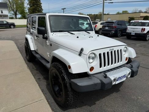 Used 2012 Jeep Wrangler Unlimited Sahara w/ Dual Top Group AWD/4WD image 11