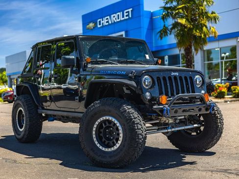 Used 2014 Jeep Wrangler Unlimited Rubicon w/ Max Tow Package AWD/4WD image 1