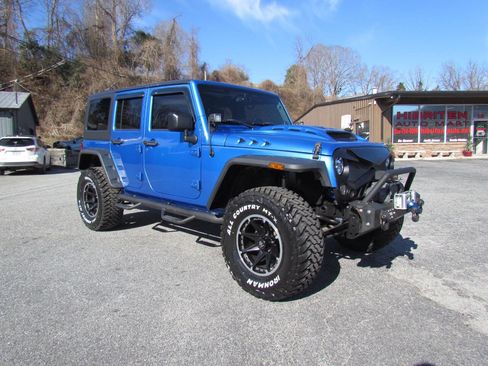 Used 2014 Jeep Wrangler Unlimited Sport image 1
