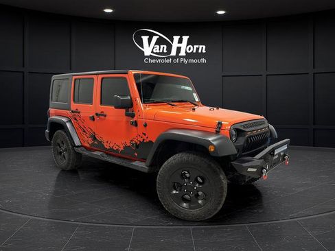 Used 2015 Jeep Wrangler Unlimited Sahara w/ Dual Top Group AWD/4WD image 1