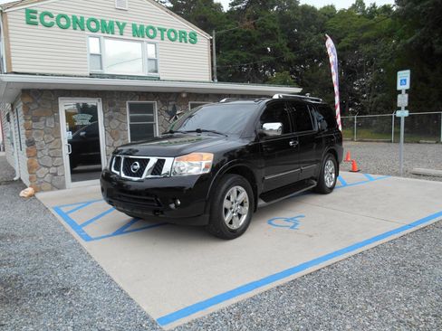 Used 2011 Nissan Armada Platinum w/ 2nd Row Captain Seat Pkg AWD/4WD image 1