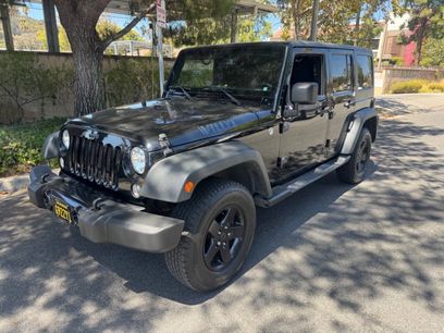 Used 2015 Jeep Wrangler Unlimited Sport w/ Dual Top Group