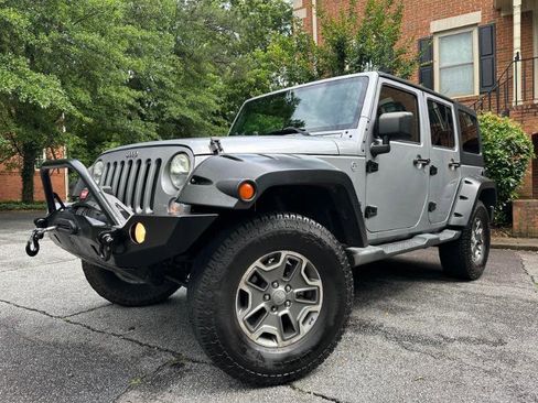 Used 2014 Jeep Wrangler Unlimited Sport AWD/4WD image 1