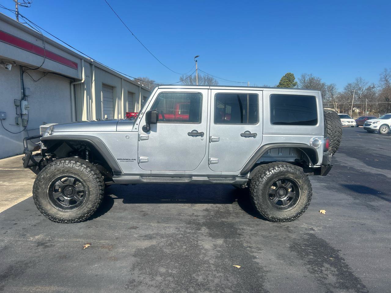 Used 2013 Jeep Wrangler Unlimited Sahara w/ Dual Top Group AWD/4WD image 7