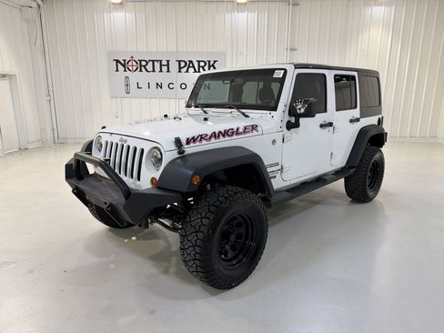 Used 2013 Jeep Wrangler Unlimited Sport AWD/4WD image 1