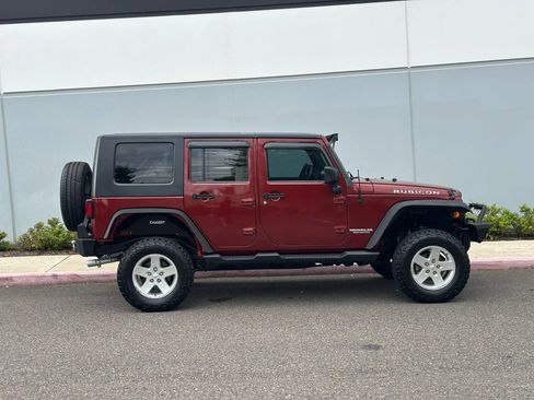 Used 2010 Jeep Wrangler Unlimited Rubicon w/ Dual Top Group image 6