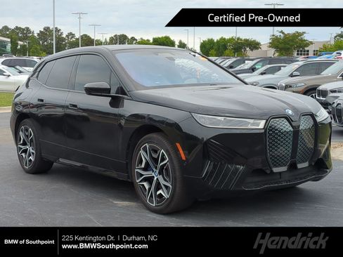 Used 2024 BMW iX xDrive50 w/ Premium Package AWD/4WD image 1