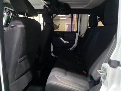 Used 2013 Jeep Wrangler Unlimited Sahara w/ Dual Top Group AWD/4WD image 19