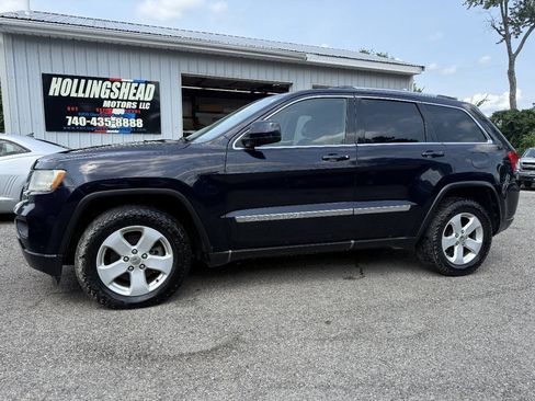 Used 2011 Jeep Grand Cherokee Laredo AWD/4WD image 1