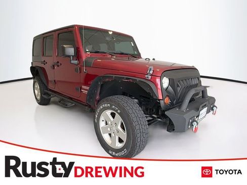 Used 2013 Jeep Wrangler Unlimited Sport AWD/4WD image 1