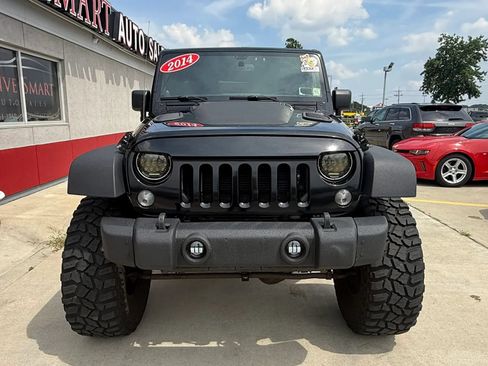 Used 2014 Jeep Wrangler Unlimited Rubicon w/ Dual Top Group AWD/4WD image 6