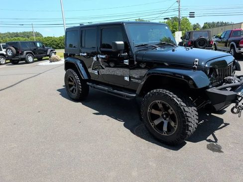 Used 2012 Jeep Wrangler Unlimited Sahara w/ Dual Top Group AWD/4WD image 14