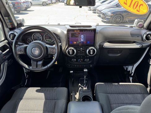 Used 2012 Jeep Wrangler Unlimited Sahara w/ Dual Top Group AWD/4WD image 26