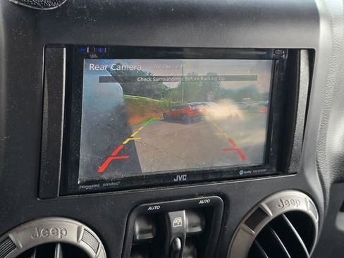 Used 2013 Jeep Wrangler Unlimited Sport AWD/4WD image 9