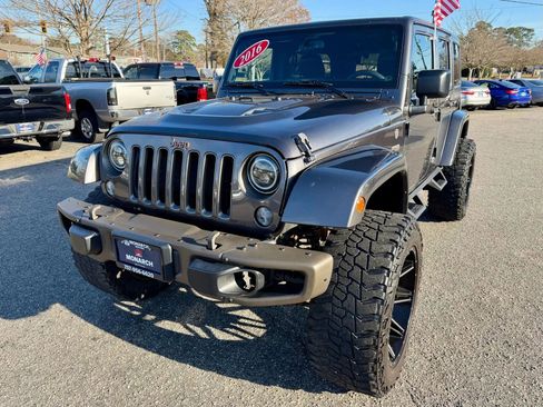 Used 2016 Jeep Wrangler Unlimited Sahara AWD/4WD image 1