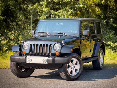 Used 2011 Jeep Wrangler Unlimited Sahara w/ Dual Top Group