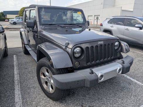 Used 2014 Jeep Wrangler Unlimited Sahara w/ Connectivity Group AWD/4WD image 1