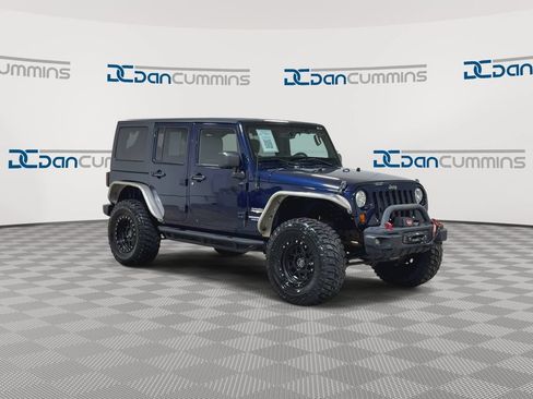 Used 2013 Jeep Wrangler Unlimited Sahara w/ Dual Top Group AWD/4WD image 2