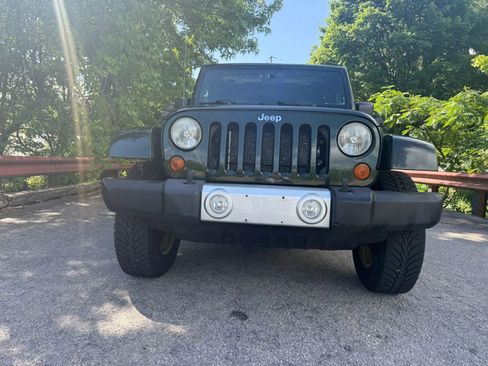 Used 2012 Jeep Wrangler Unlimited Sahara w/ Dual Top Group AWD/4WD image 2