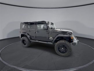 Used 2015 Jeep Wrangler Unlimited Sahara w/ Dual Top Group video 2