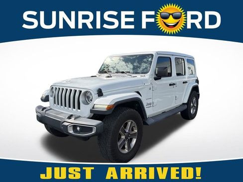 Used 2019 Jeep Wrangler Unlimited Sahara w/ Safety Group image 1