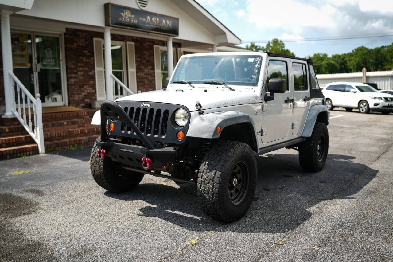 Used 2012 Jeep Wrangler Unlimited Rubicon w/ Dual Top Group AWD/4WD image 12