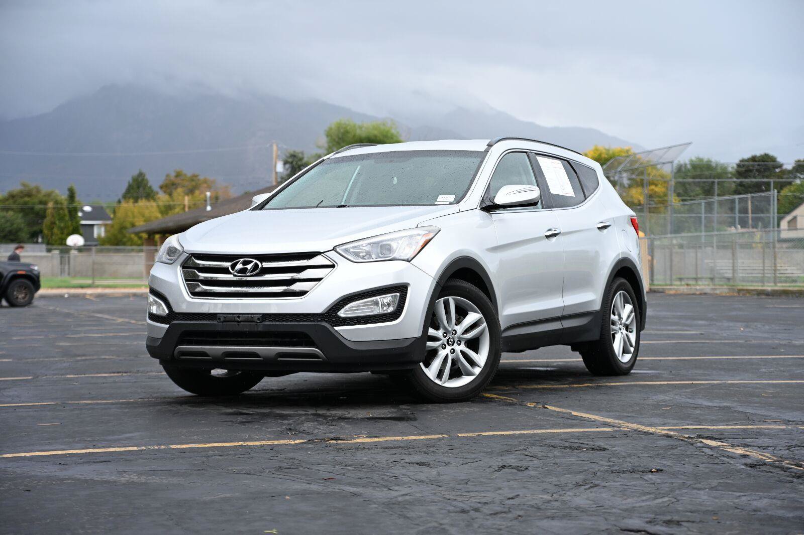 Used 2014 Hyundai Santa Fe Sport 2.0T w/ Navigation Package 06 AWD/4WD image 1