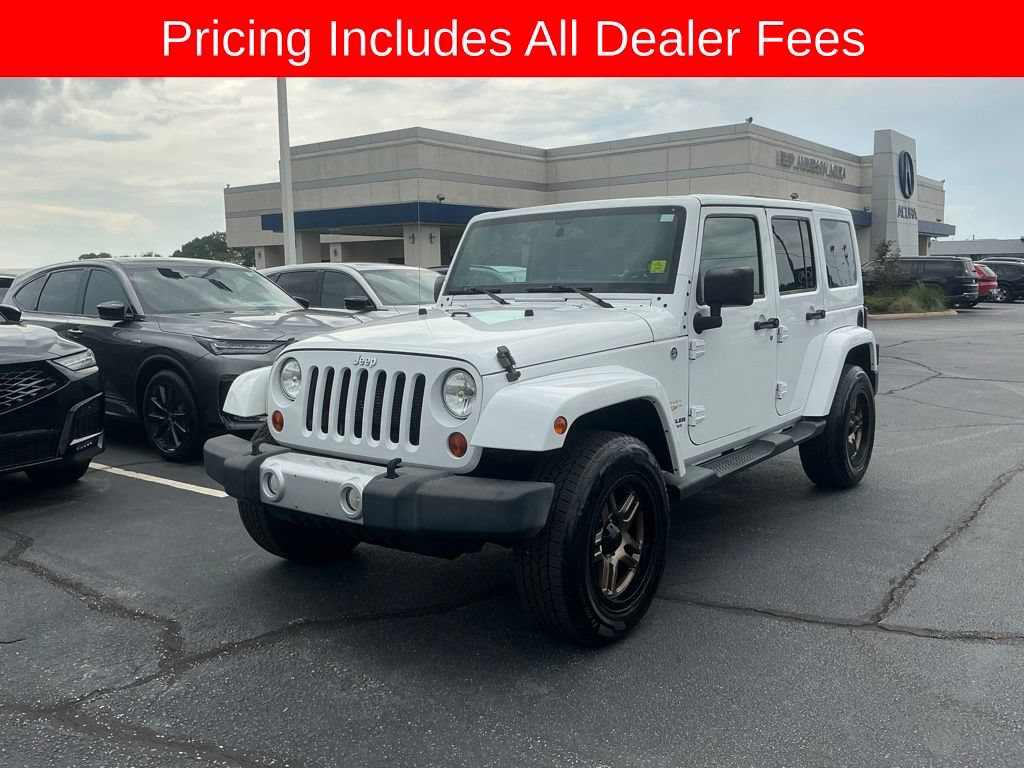 Used 2013 Jeep Wrangler Unlimited Sahara w/ Dual Top Group AWD/4WD image 1