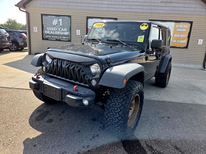 Used 2014 Jeep Wrangler Unlimited Sahara w/ Dual Top Group