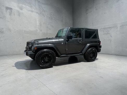 Used 2014 Jeep Wrangler Sahara w/ Connectivity Group AWD/4WD image 1