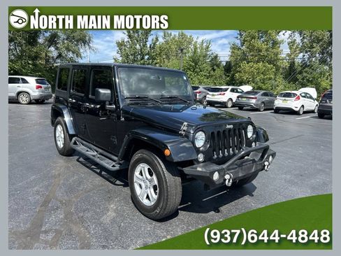 Used 2014 Jeep Wrangler Unlimited Sahara w/ Max Tow Package AWD/4WD image 1