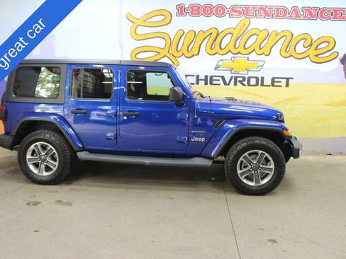 Used 2019 Jeep Wrangler Unlimited Sahara w/ Uconnect 4C Nav & Sound Group AWD/4WD image 1