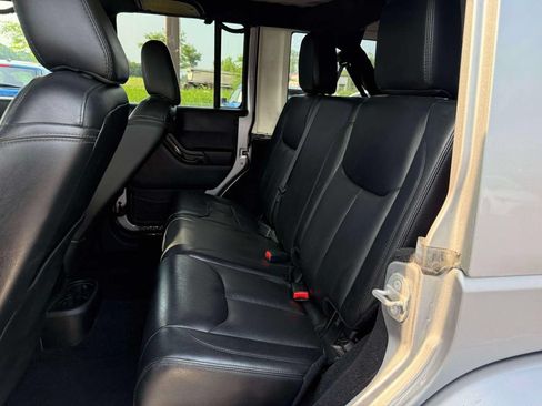 Used 2015 Jeep Wrangler Unlimited Sahara w/ Dual Top Group AWD/4WD image 11