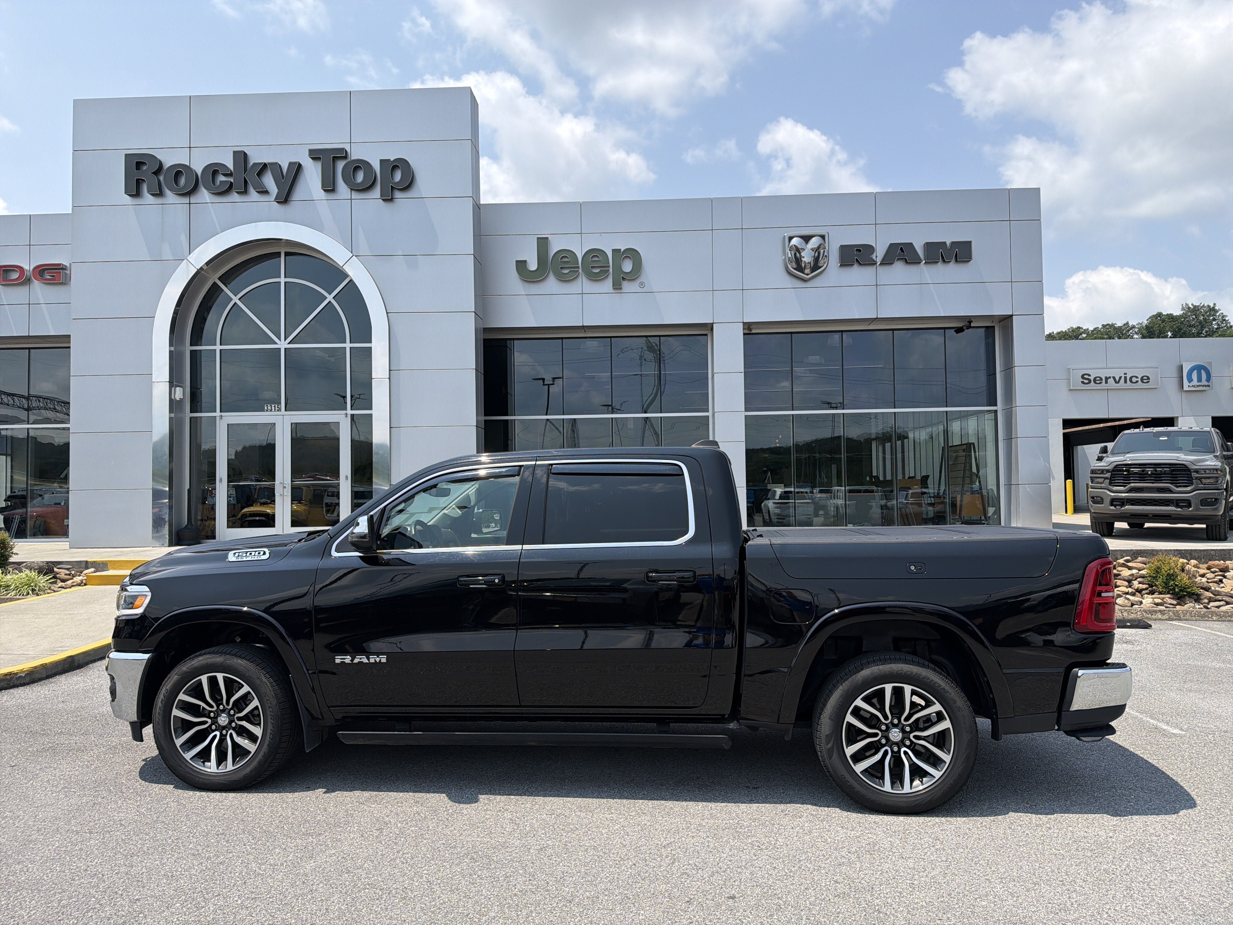 Used 2025 RAM 1500 Limited w/ Bed Utility Group AWD/4WD image 1