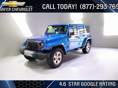 Used 2015 Jeep Wrangler Unlimited Sahara w/ Dual Top Group