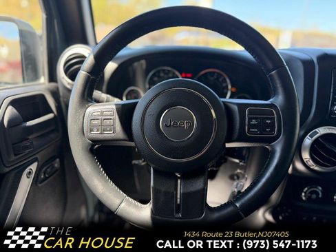 Used 2015 Jeep Wrangler Unlimited Rubicon w/ Dual Top Group AWD/4WD image 26