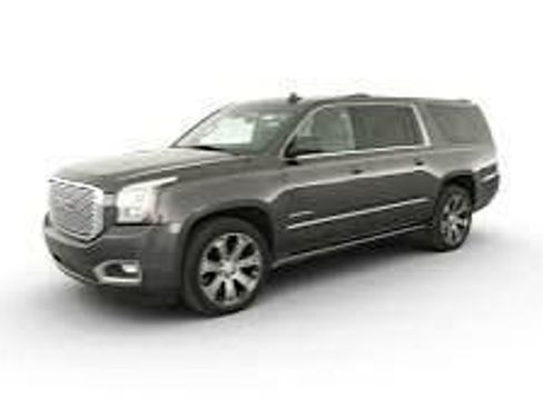 Used 2017 GMC Yukon Denali w/ Open Road Package AWD/4WD image 1