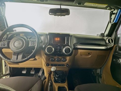 Used 2013 Jeep Wrangler Unlimited Sahara w/ Dual Top Group AWD/4WD image 13