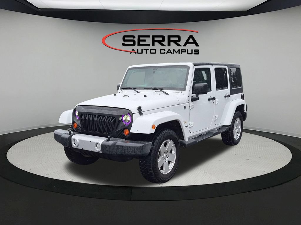 Used 2012 Jeep Wrangler Unlimited Sahara w/ Dual Top Group AWD/4WD image 1