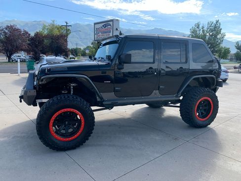 Used 2010 Jeep Wrangler Unlimited Rubicon w/ Dual Top Group image 2