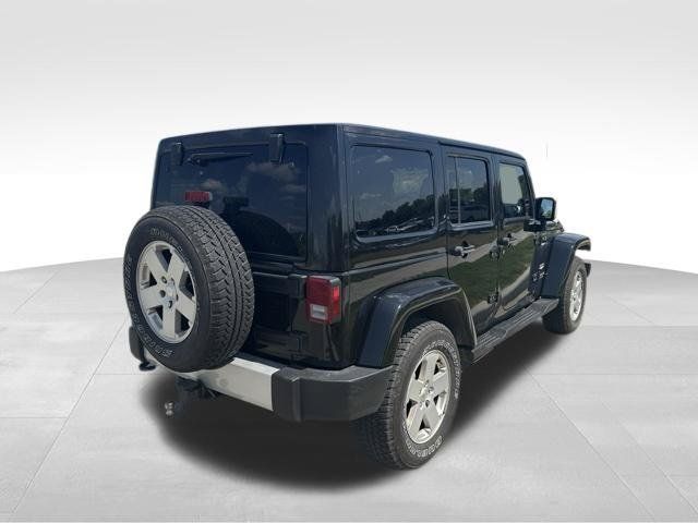 Used 2012 Jeep Wrangler Unlimited Sahara w/ Dual Top Group AWD/4WD image 3