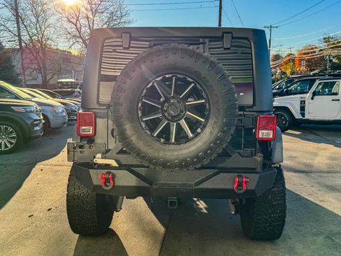 Used 2013 Jeep Wrangler Unlimited Rubicon w/ Dual Top Group image 4