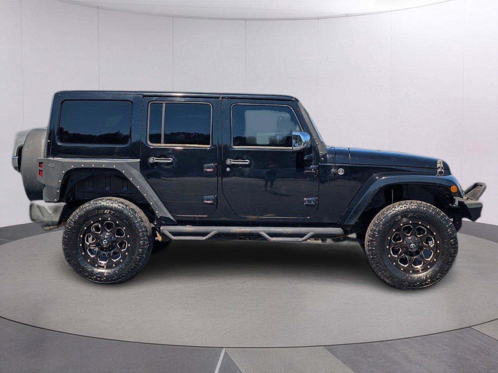 Used 2012 Jeep Wrangler Unlimited Sahara AWD/4WD image 6