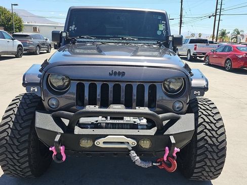Used 2014 Jeep Wrangler Unlimited Sahara w/ Connectivity Group AWD/4WD image 2