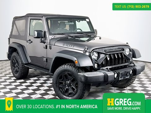 Used 2018 Jeep Wrangler Sport image 1